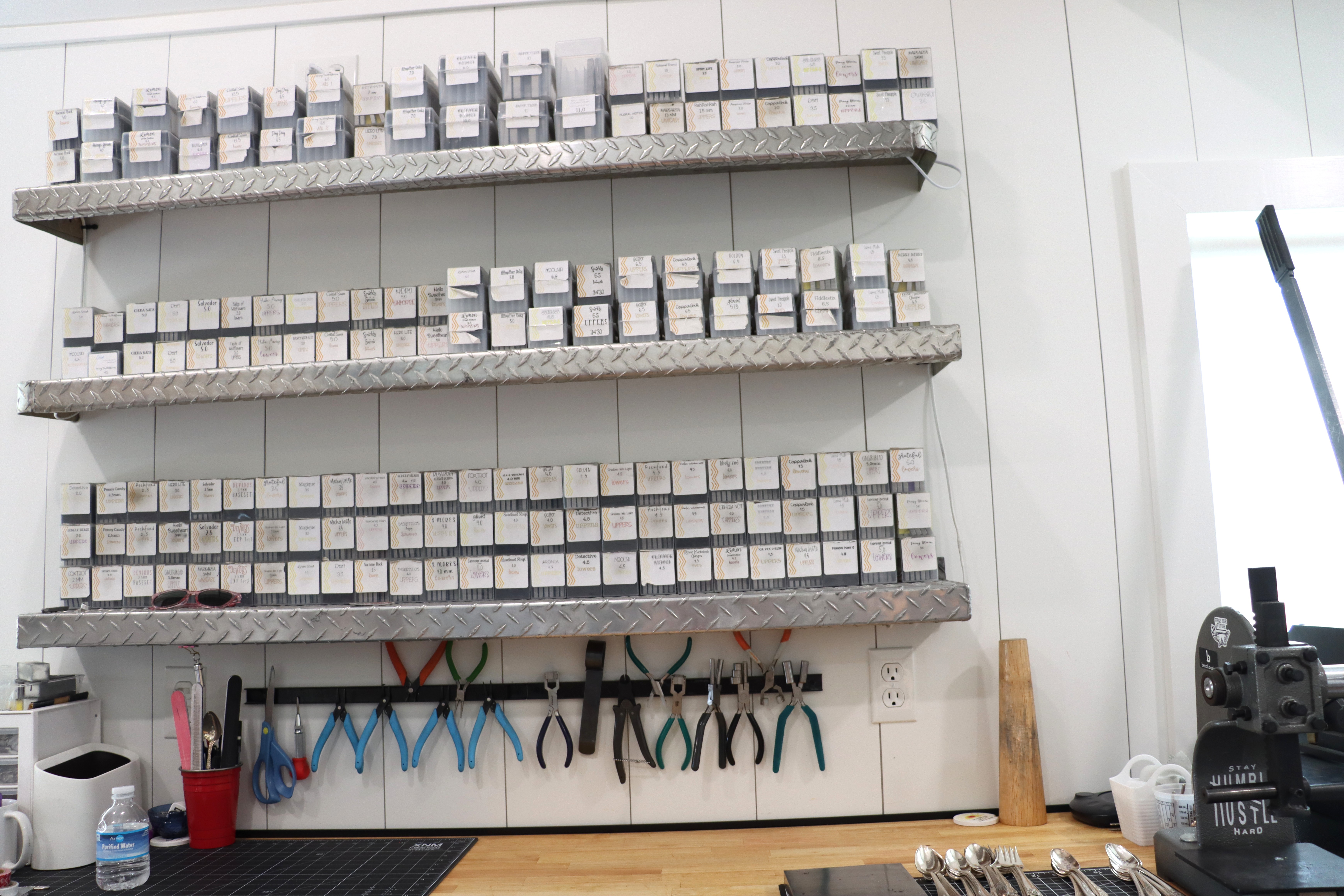 Wall of letters/symbols for metal stamping