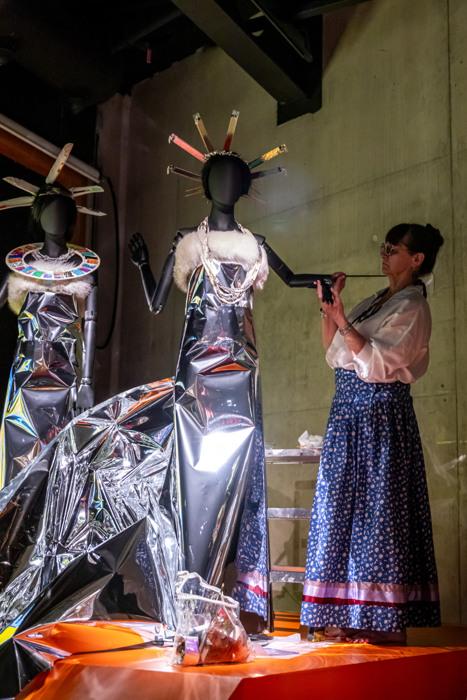Sweden: Ponca preparing one of her Mylar Star People for exhibit